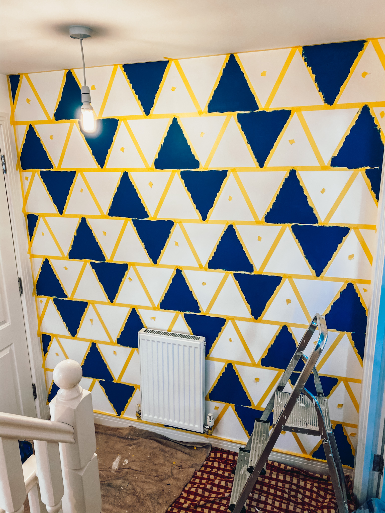 DIY Triangles Creating Wall Patterns with Painter's Tape Adventures